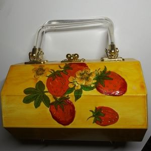 Vintage homemade wooden purse with strawberries
